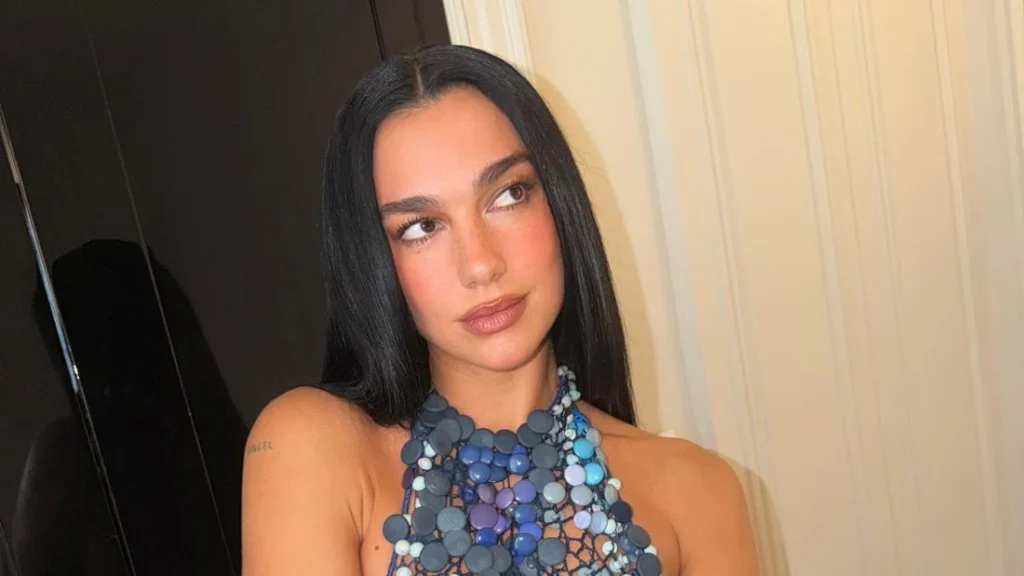 dua-lipa-stuns-in-avant-garde-masterpiece-a-closer-look-at-the-740-button-top-that-captured-the-fashion-world